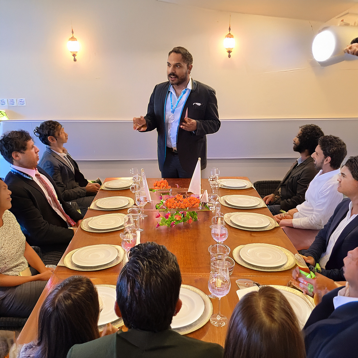 Videographer filming a live event with a cinema camera